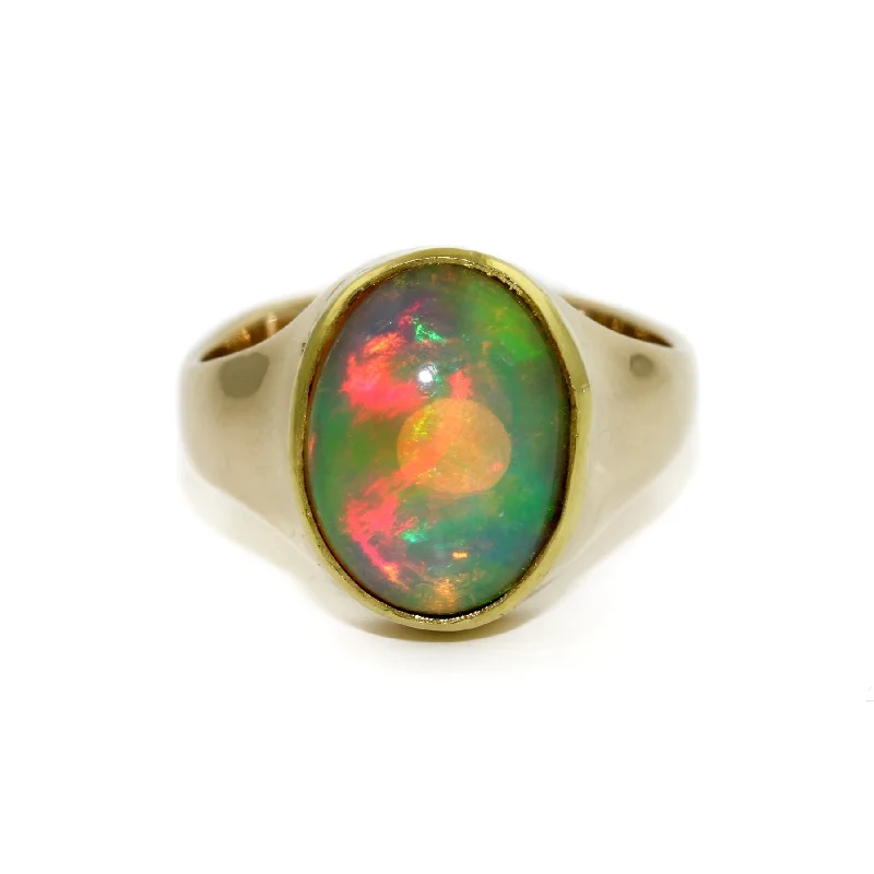 Spiral design rings-18k Ethiopian Oval Opal Ring